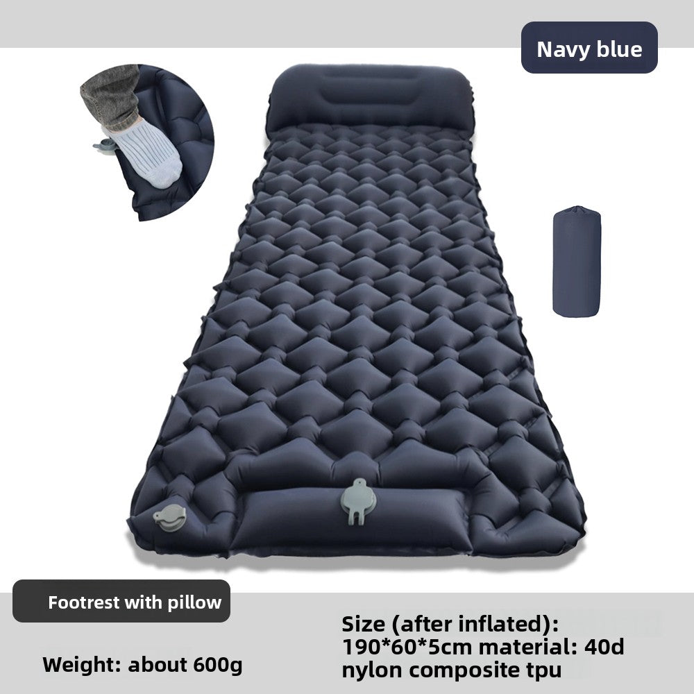 Inflatable sleeping mat in navy, showing the integrated pillow and foot pump