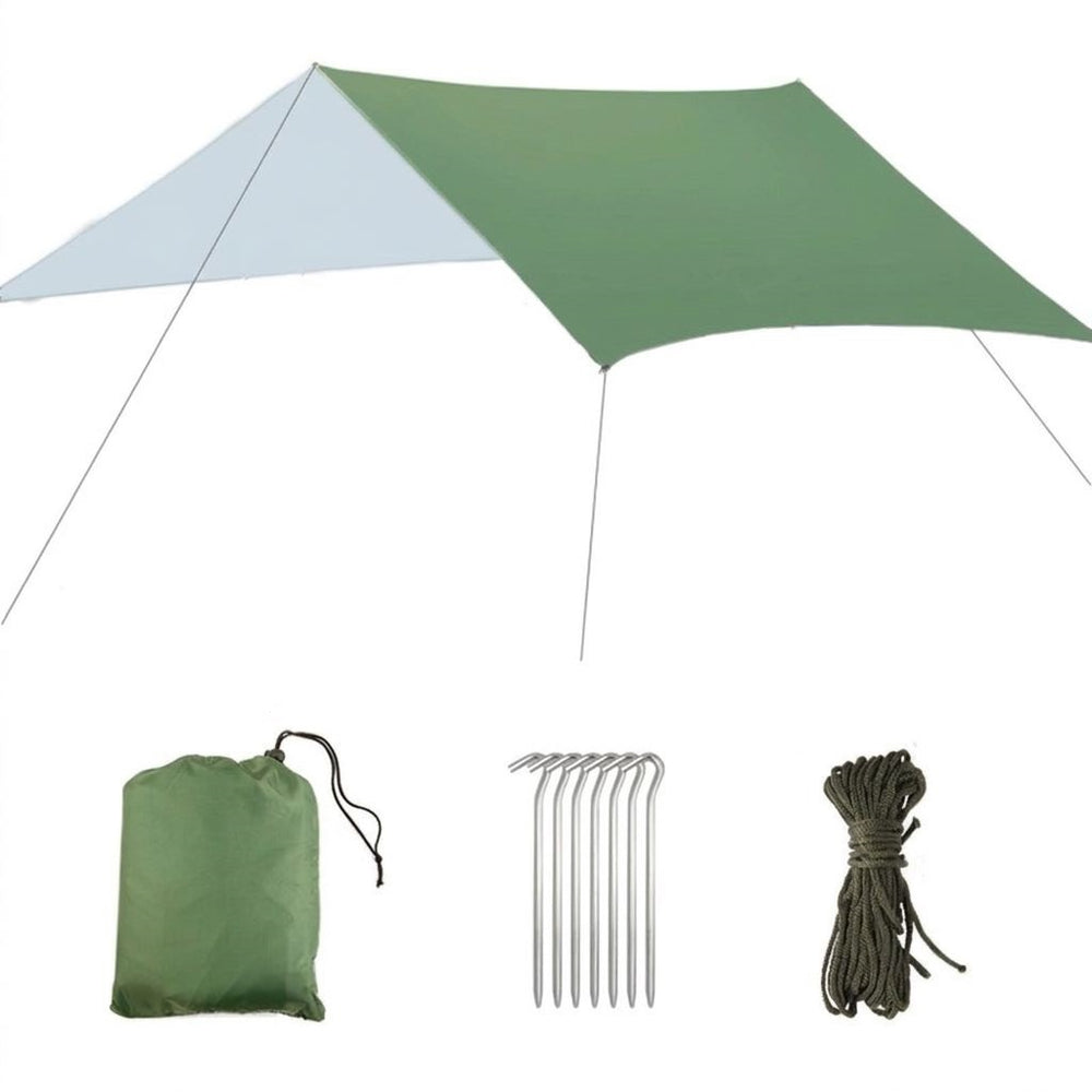 Green tarp pitched with guy lines, shown with its stuff sack, six pegs and guy rope