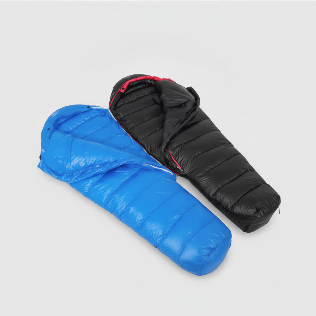 Down mummy sleeping bag unzipped and opened out flat, in blue and black